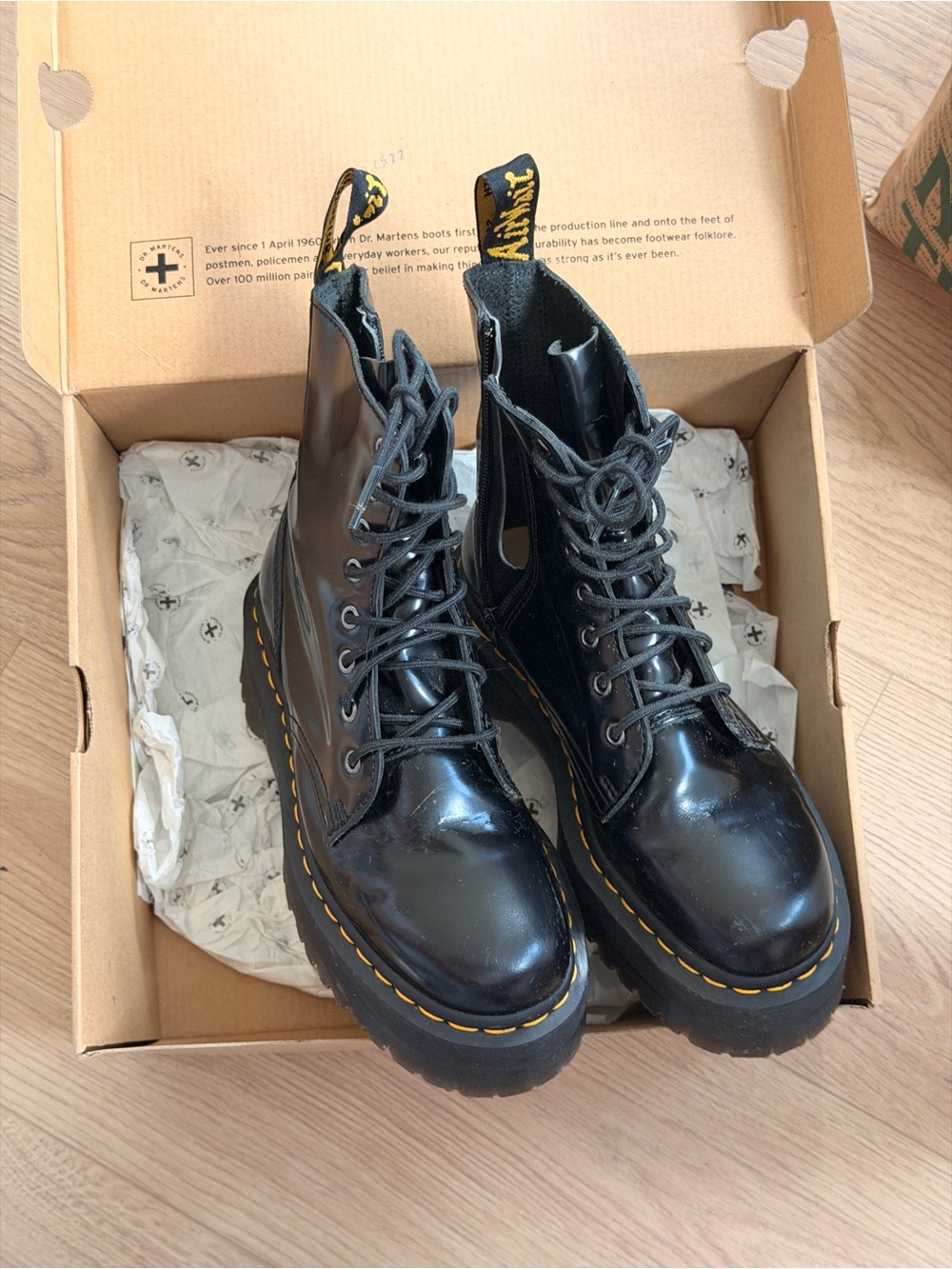Dr. Martens Black Patent Leather Lace-Up Platform Boots with Yellow Stitching